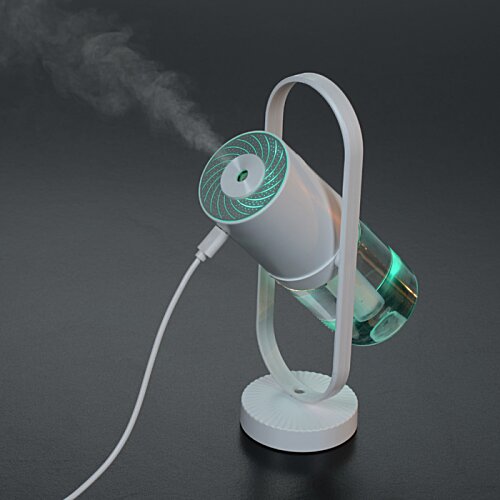 Additional Image 9 - a white and green device with a wire
