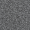 a grey surface with a black spot