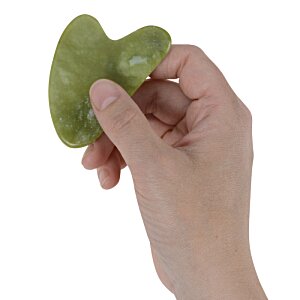 Additional Image 4 - a hand holding a piece of green material