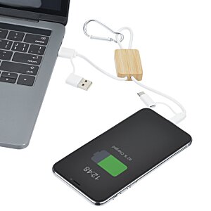 Additional Image 4 - a black rectangular device with a green light on it next to a laptop