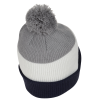 a grey and white beanie