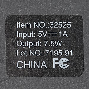 Additional Image 4 - a black and white label with white text