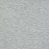 a white surface with black specks
