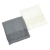 a white and grey square napkins