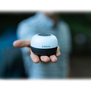 Additional Image 10 - a person holding a small round object