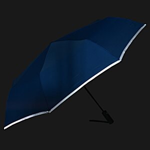Additional Image 3 - a blue umbrella on a black background