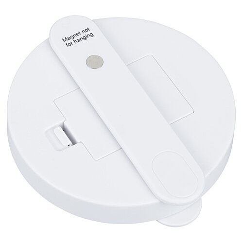 Additional Image 2 - a white circular object with a button