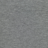 a grey surface with a black spot