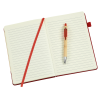 a pen on a notebook