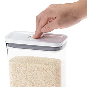 Additional Image 6 - a hand pressing a button on a plastic container