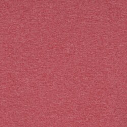 a pink surface with a white spot