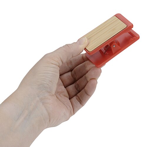 Additional Image 3 - a hand holding a red object