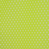 a green and white polka dot fabric