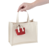 Additional Image 1 - a hand holding a white bag