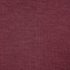 a red fabric with a white spot