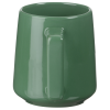 a green mug with a handle