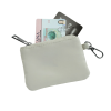 a white purse with money and credit cards