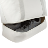 a white bag with a black object in it