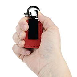 a hand holding a red lighter
