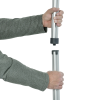 a person holding a metal pole