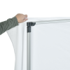 a person holding a white board