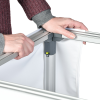 a person holding a metal bar