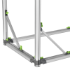 a metal frame with green screws