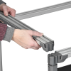 a person holding a metal bar