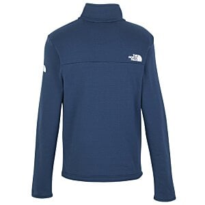 Additional Image 2 - a blue jacket with a white logo