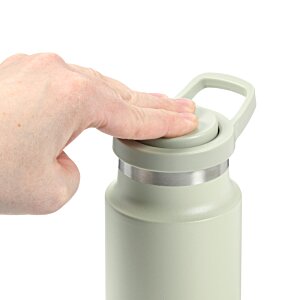 Additional Image 5 - a hand holding a bottle
