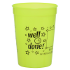a green plastic cup with black text