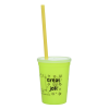 a green cup with a straw