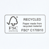 a white rectangle with black text and a tree