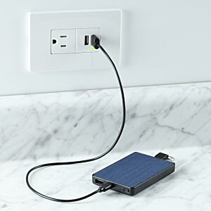 Additional Image 5 - a device plugged into a wall outlet