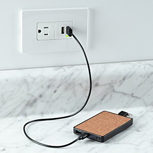 Additional Image 3 - a phone charging in a wall outlet