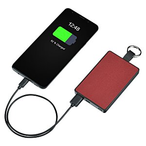 Additional Image 2 - a black and red device with a green battery