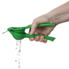 a hand holding a green squeezer