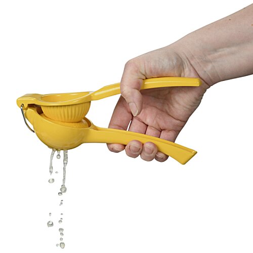 Additional Image 4 - a hand holding a yellow measuring spoon