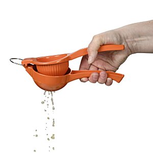 Additional Image 4 - a hand holding an orange juicer