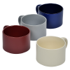 a group of different colored cups