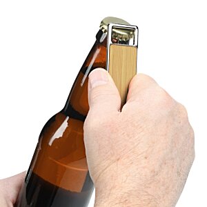 Additional Image 3 - a hand opening a beer bottle