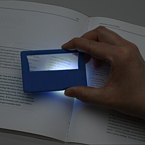 Additional Image 4 - a hand holding a blue rectangular object with a light on it