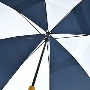 a close up of a blue and white umbrella