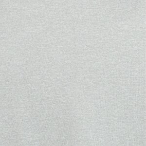 a white surface with black spots