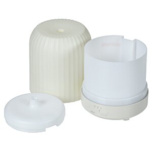 Additional Image 3 - a white cylindrical object with a white lid
