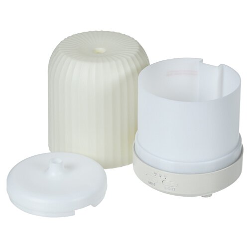 Additional Image 3 - a white cylindrical object with a white lid