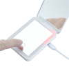 Additional Image 4 - a hand holding a small device