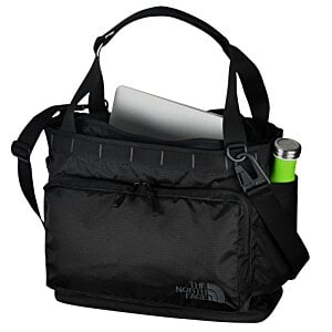 Additional Image 3 - a black bag with a white paper and a green pen in it