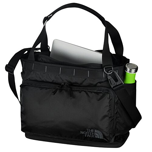 Additional Image 3 - a black bag with a white paper and a green pen in it