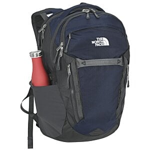 Additional Image 1 - a blue backpack with a red bottle in it